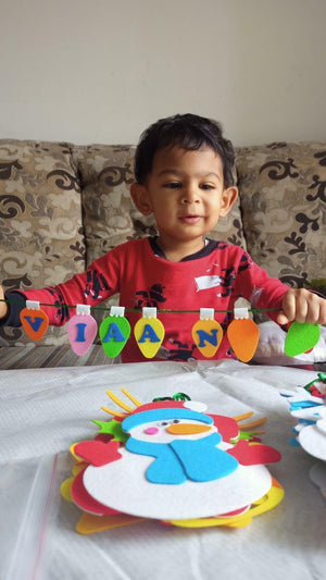 Creative holiday play activity for kids with safe Montessori tree.