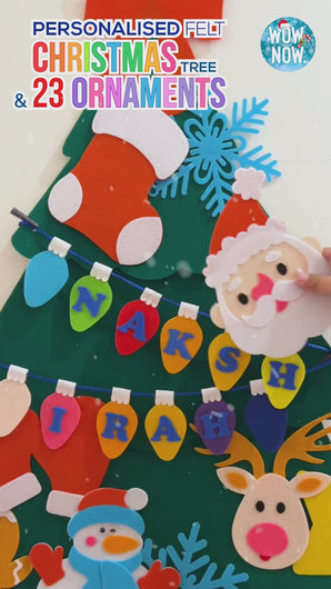 Toddler Christmas sensory play felt tree with Velcro ornaments.