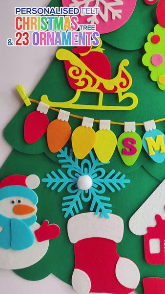 Load and play video in Gallery viewer, Personalized Wall Hanging Montessori DIY Felt Christmas Tree with 23 Colorful Felt Ornaments, Christmas Tree Gift Toddler
